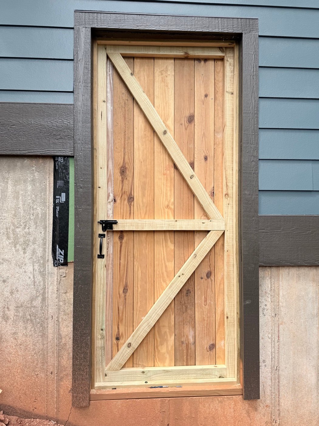 Interior door installation and decorative wood accent wall