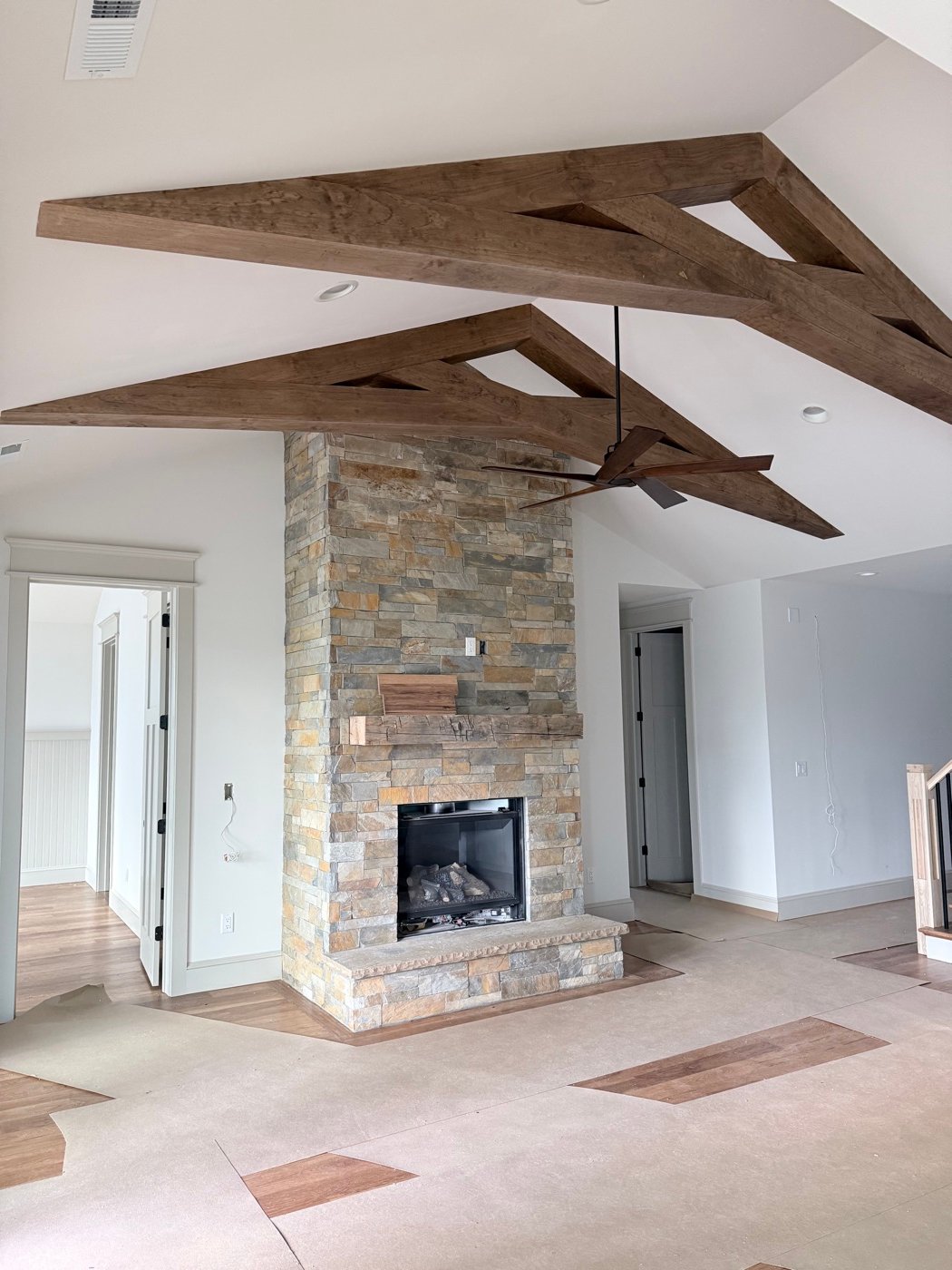Interior stair railing and custom fireplace mantel millwork